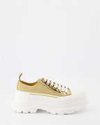 Baskets Baskets Tread Slick en toile Alexander McQueen Doré Femme