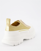 Baskets Baskets Tread Slick en toile Alexander McQueen Doré Femme