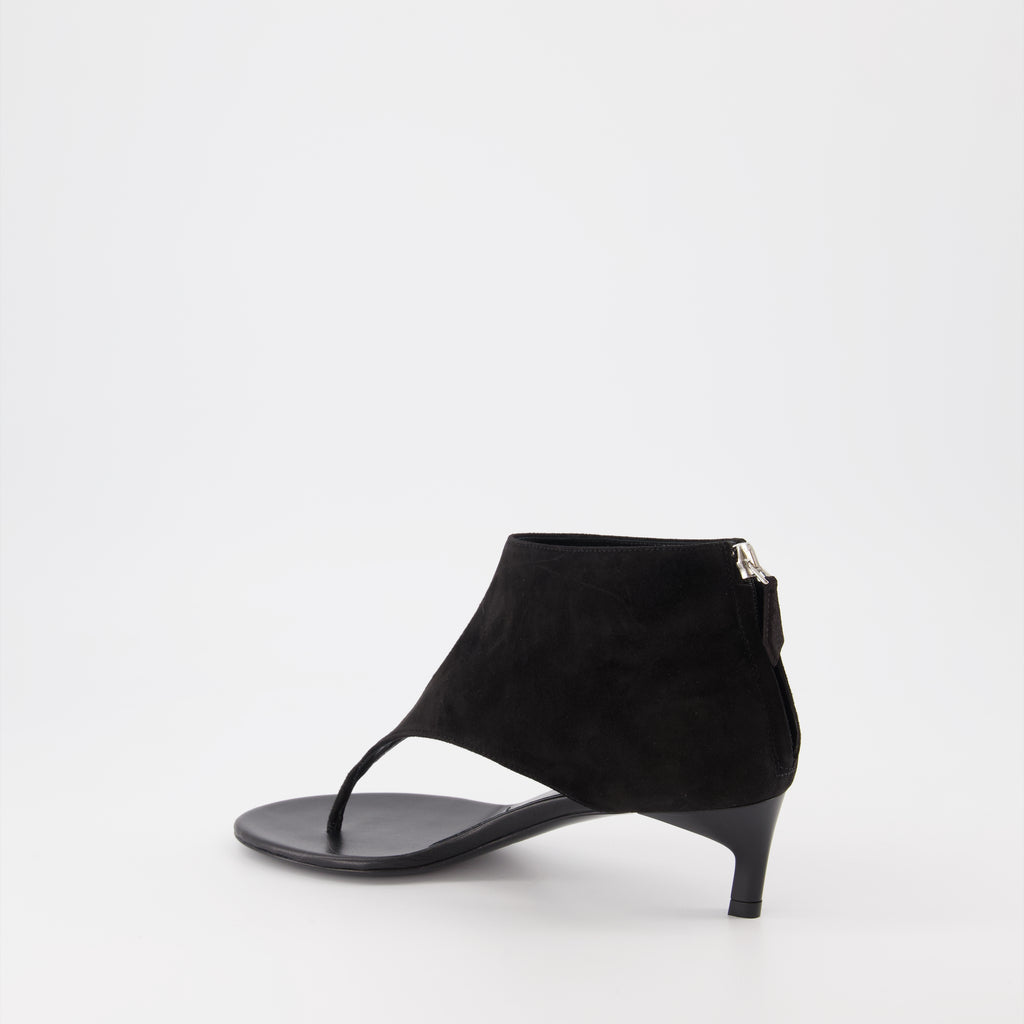 Bottines tongs en cuir noir