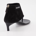 Bottines tongs en cuir noir