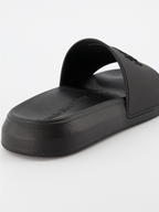 Sneaker Claquettes à logo Alexander McQueen Schwarz Femme