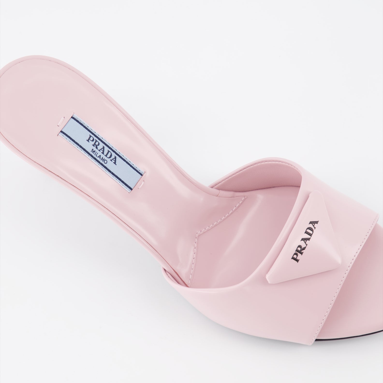 Chaussures ouvertes Mules en cuir Prada Rose Femme