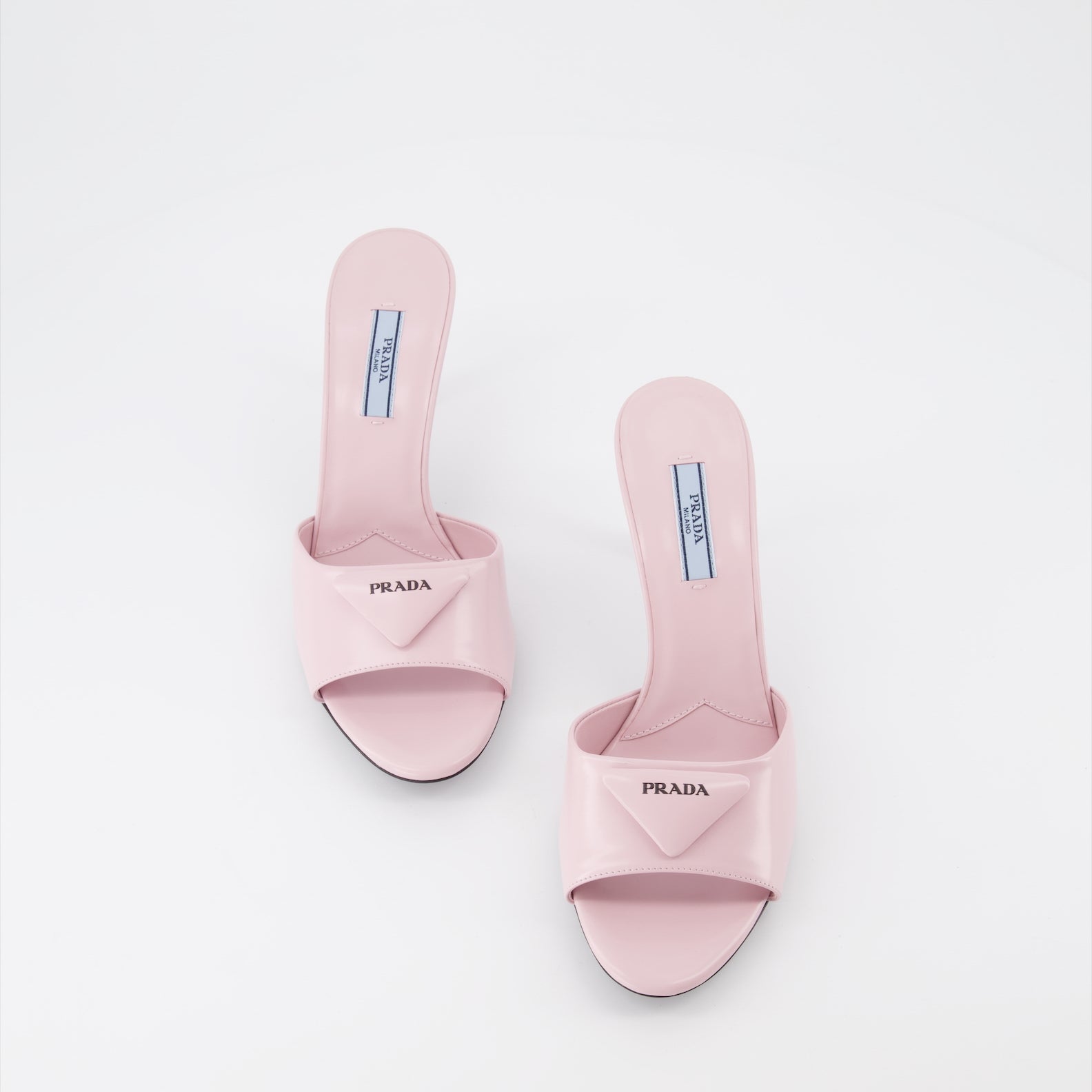 Chaussures ouvertes Mules en cuir Prada Rose Femme